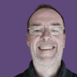 Profile picture of Christoffer DeGraaf, smiling at camera wearing black jumper.