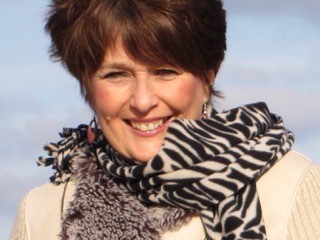Profile picture of Ruth Huckle wearing animal print scarf