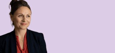 An image of Dr Nancy Doyle on a purple background