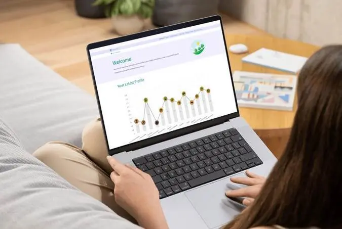photo of person remote working from their laptop