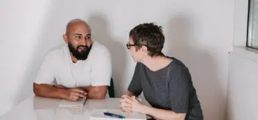 Fiona and Mo from Genius Within having a 121 chat