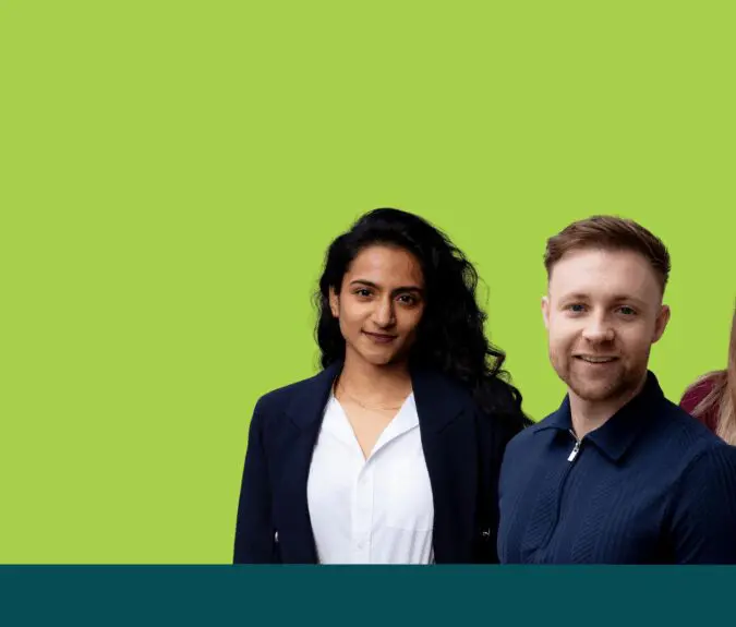 Three people standing side by side against a bright green background.