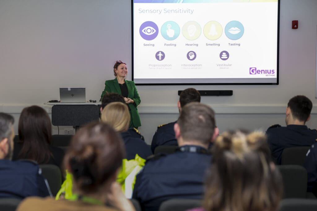 Dr Doyle giving a presentation to an audience