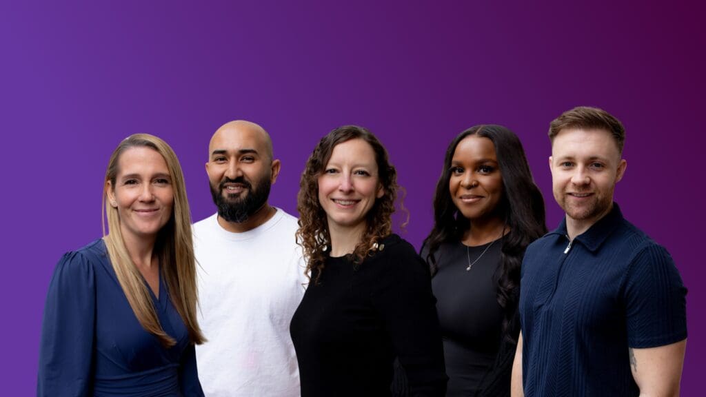 photo of GW employees - head and shoulder shot with purple background
