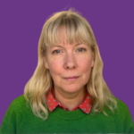 Portrait of Clare Maberly, with blonde hair, wearing a green jumper over a red patterned shirt, against a purple background.